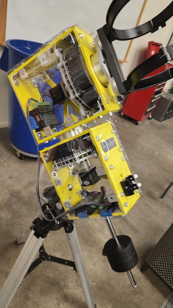 Close-up of the ASTRID mount: yellow frame with machined cycloidal drives and electronics.
